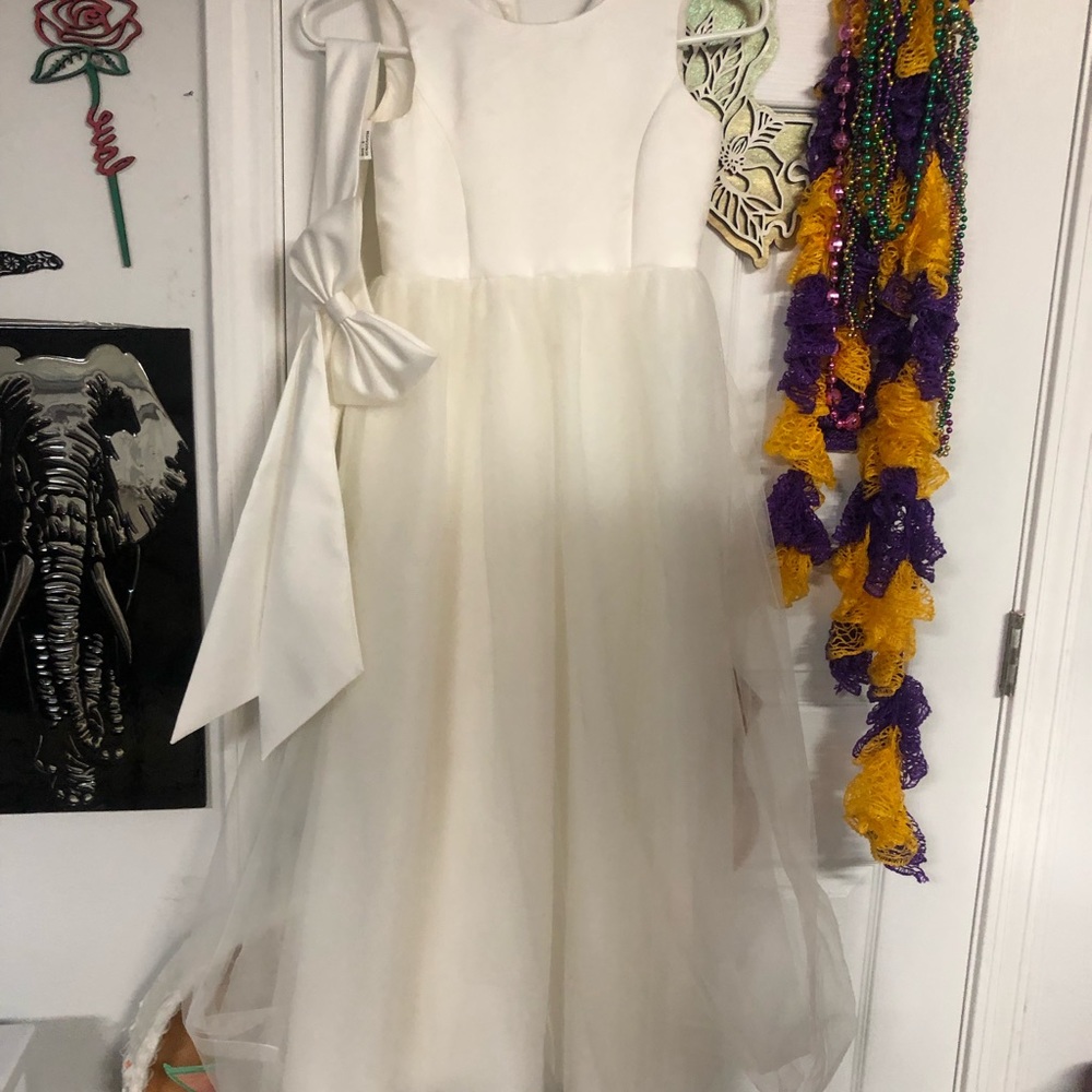 Girls size 8 crème colored flower girl dress with sash